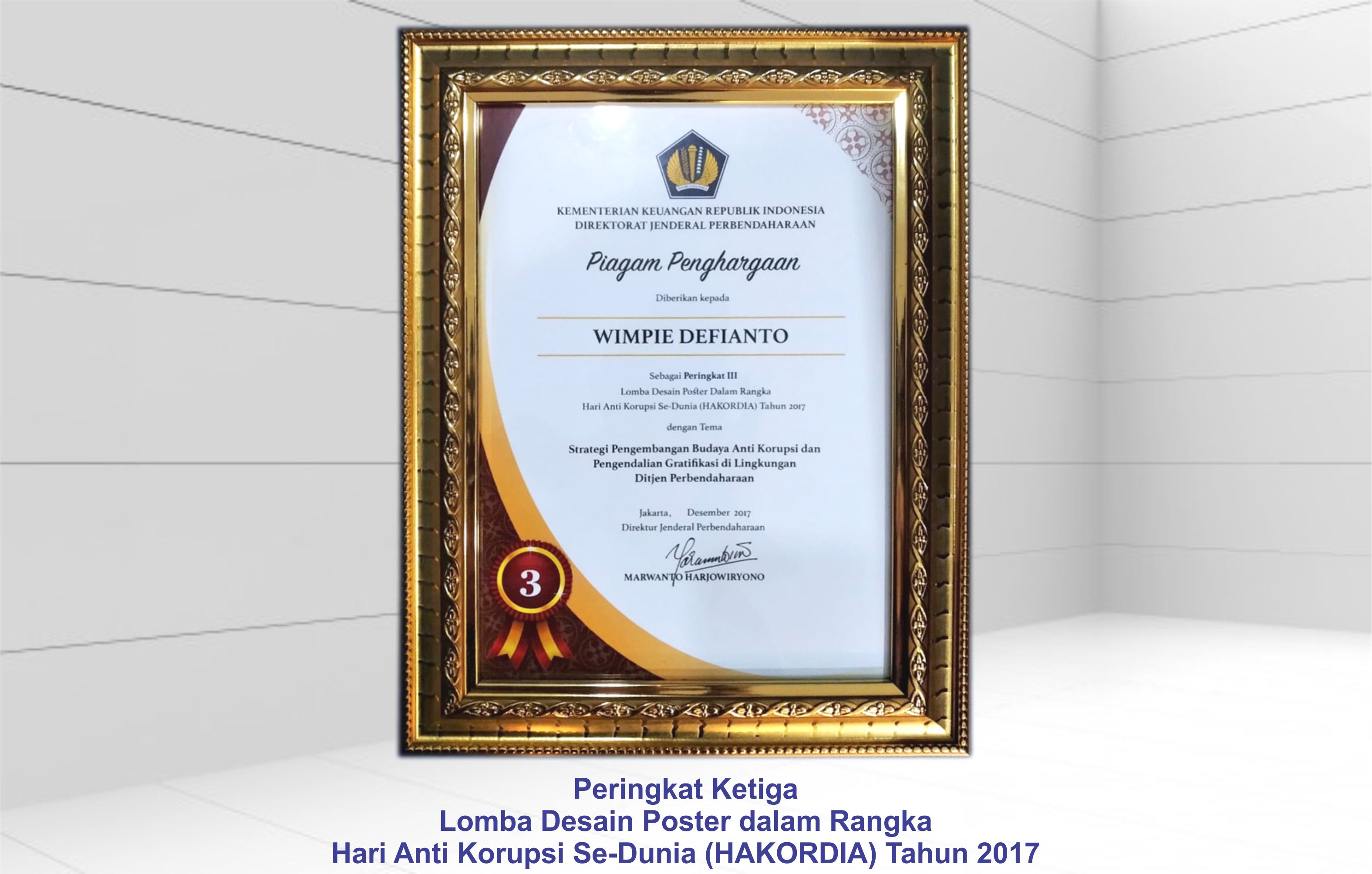 Piagam Penghargaan KPPN Makassar II Pemenang Lomba Desain Poster Hakordia 2017