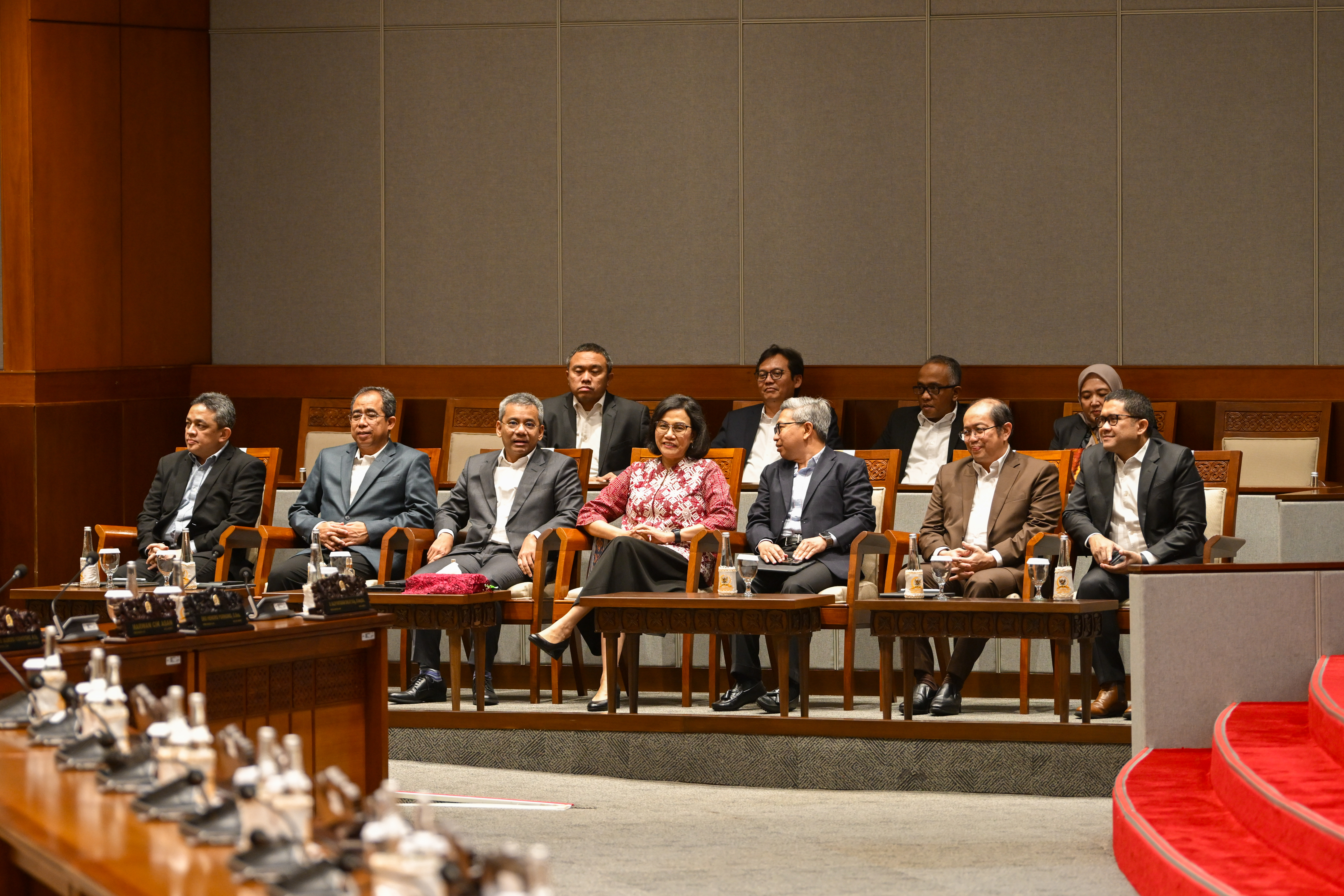 a group of people sitting in chairs